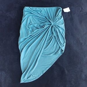 Blue A-symmetrical skirt with twist detail